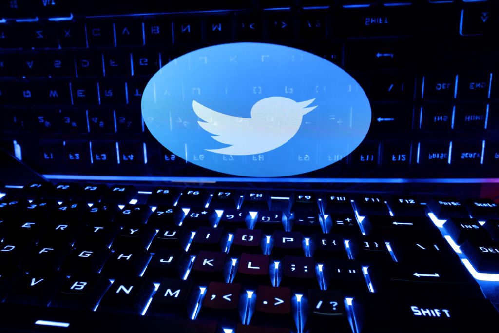 Person using a laptop to access Twitter without an account, highlighting private and secure viewing