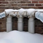 Chicago home plumbing system with visible pipes and water flow setup