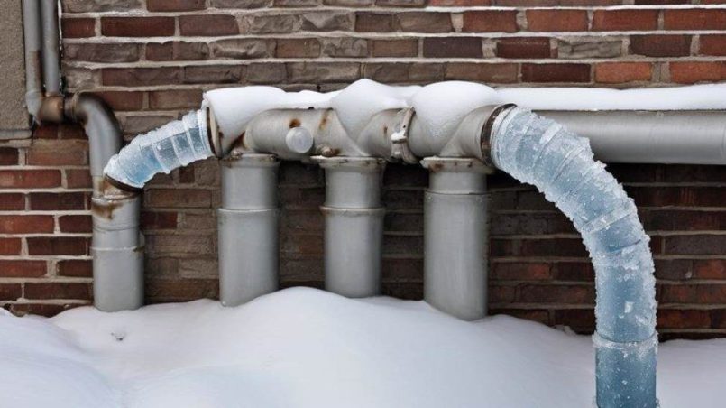 Chicago home plumbing system with visible pipes and water flow setup